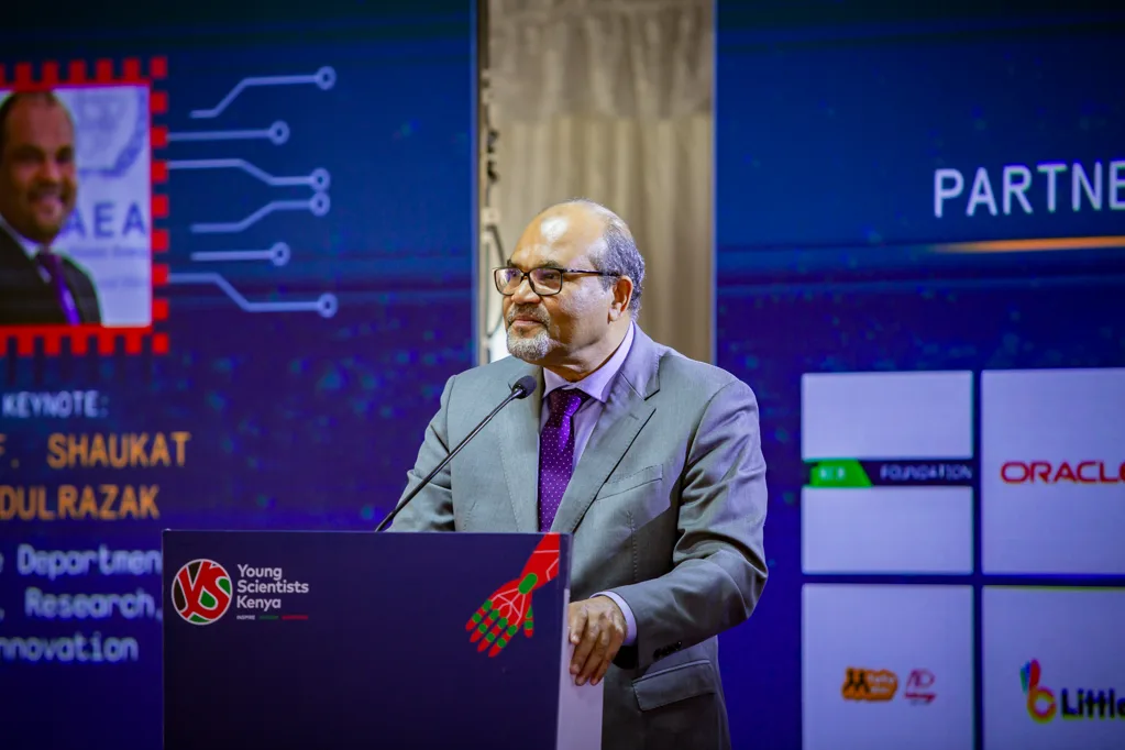 Chief Guest Prof. Shaukat Abdulrazak, Principal Secretary in the State Department for Science, Research and Innovation, delivers the opening address during the 9th Young Scientists Kenya (YSK) National STEM Exhibition at Moi Girls High School, Nairobi.