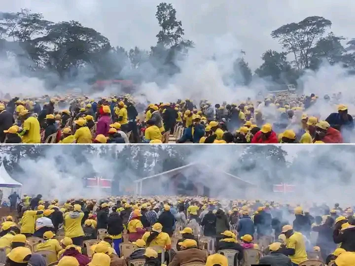 Crowd wearing yellow caps scampering during chaos at Nembure grounds in Embu during DP Kindiki Pasua Mlima meeting.