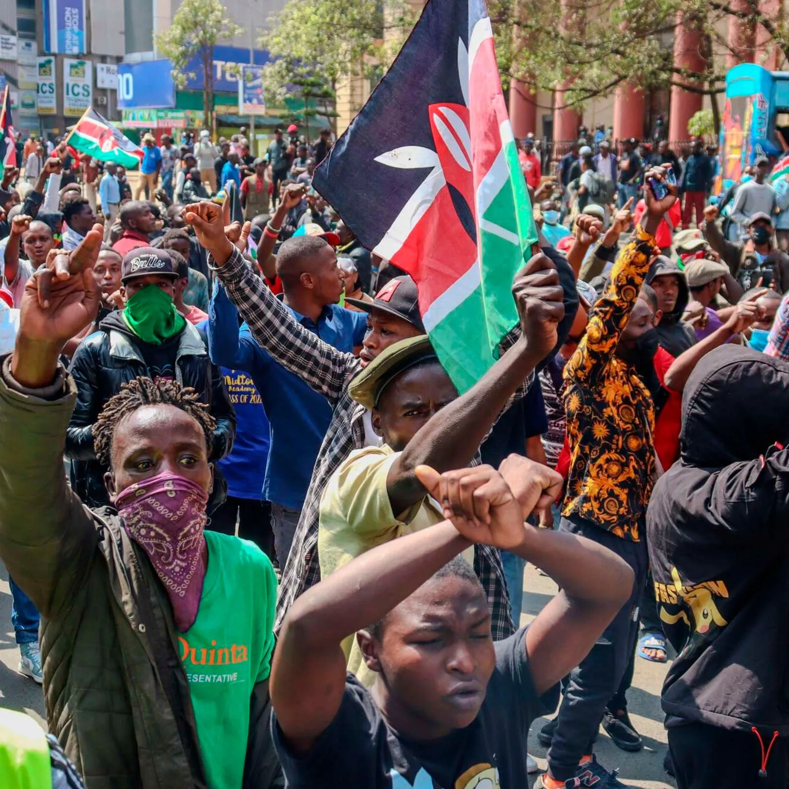 Youths in the streets protesting.